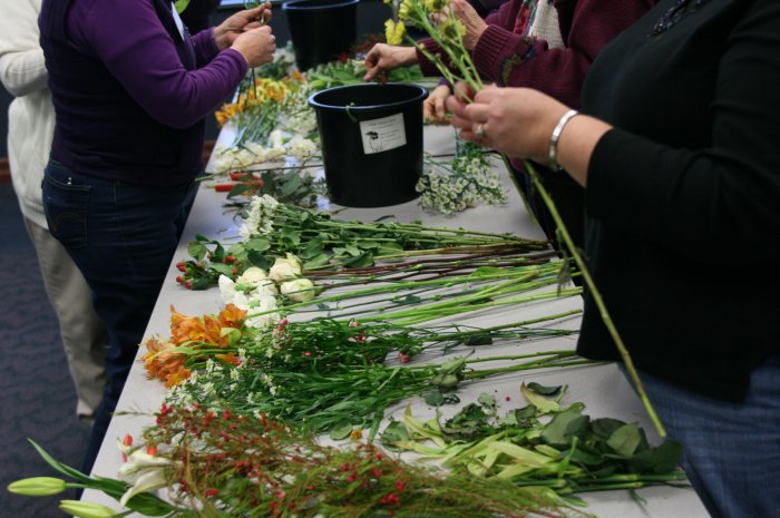 workshop participants with flowers